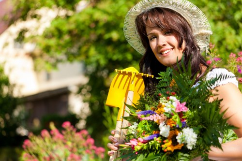 Layered Bow landscaping with shrubs, flowers, and hardscape features