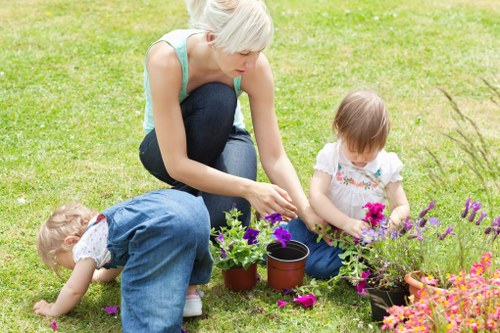 Landscaping Bow design with seasonal planting and a polished garden finish